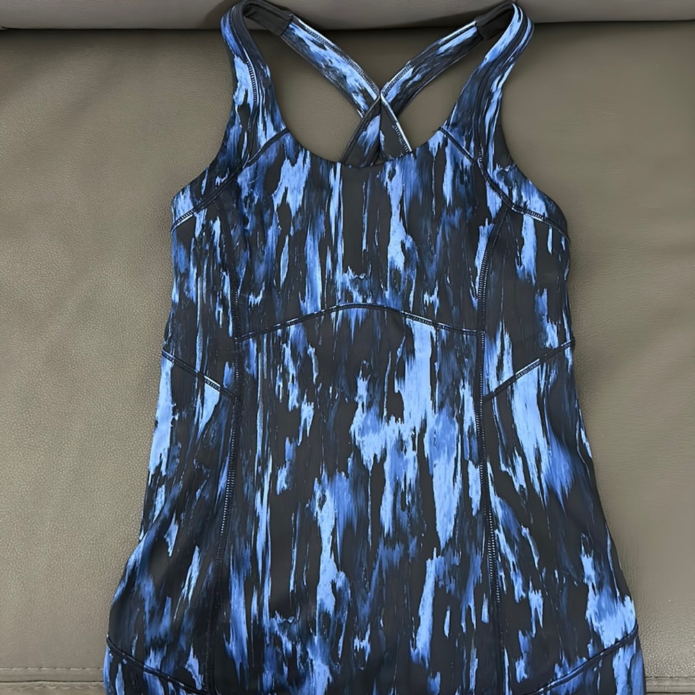 Lululemon blue/black tank. Size 4. New, never worn. Built in bra.